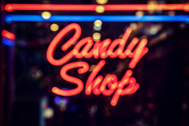 Neon sign that says Candy Shop